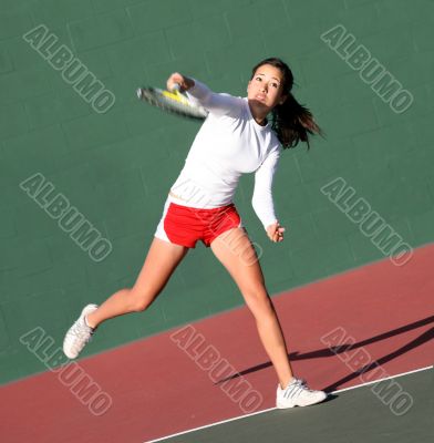 Girl playing tennis