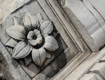 Carved stone flower
