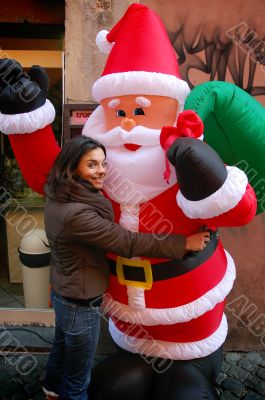 Girl hugs santa