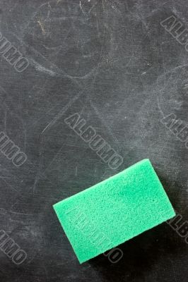 blackboard with cleaning sponge