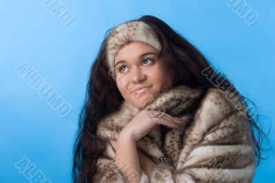 young woman in fur coat