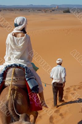 caravan of tourists in desert