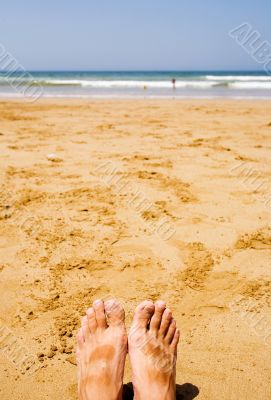 man relaxing at the beach