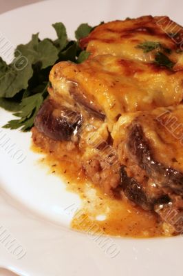 Lamb moussaka with egg plant, cheese and herbs
