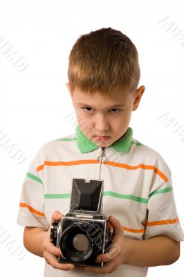 The boy with retro the camera