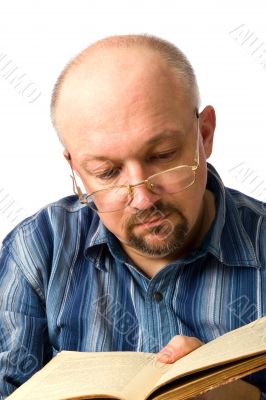 The man, reading the book.