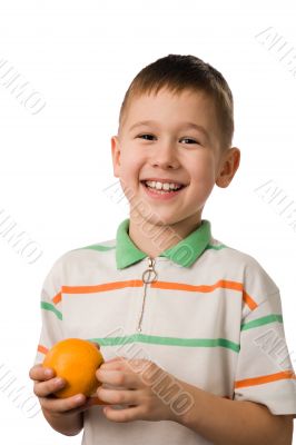 The smiling boy with an orange