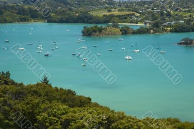 Idyllic blue lagoon with yachts