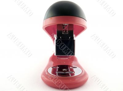 Red stapler on a white background. isolated 2