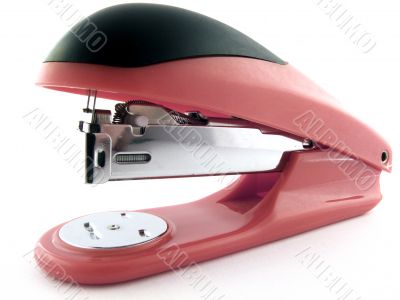 Red stapler on a white background. isolated 3