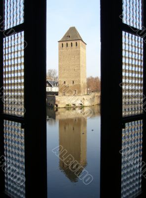 tower and reflection through the window