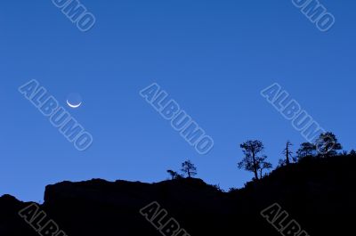 Crescent Moon Above Cliff