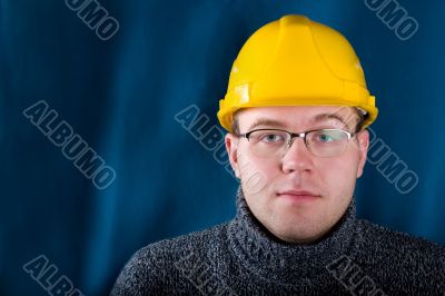 Engineer in yellow helmet