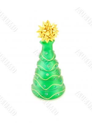 new-year candle in form the decorated fir-tree on a white backgr