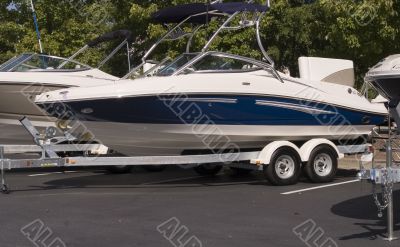 Blue and White Boat on Trailer