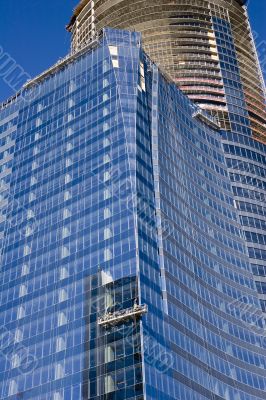 Blue Glass and Construction Tower