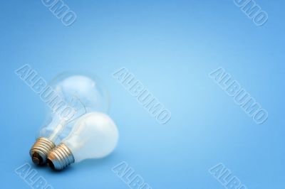 Background with lit lightbulb
