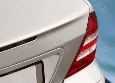 Closeup image of a silver mercedes