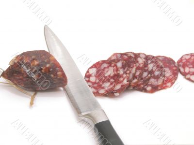 summer sausage and  kitchen knife