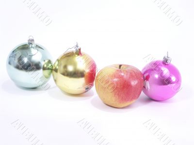 Christmas-tree decorations and apple