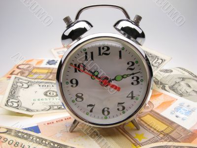 alarm clock and money