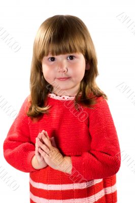 little girl wearing red dress praying for...