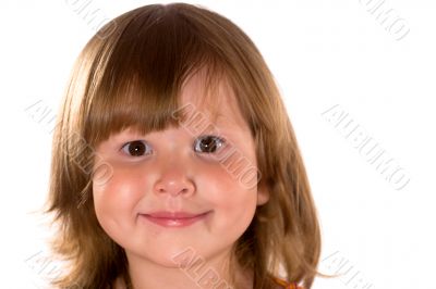 Studio portrait of a pretty smiling girl