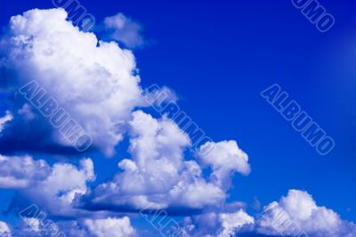 Beautiful row of clouds in vivid sky