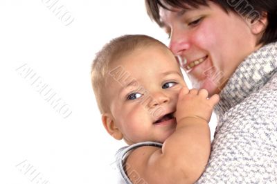 Smiling mother holding her baby