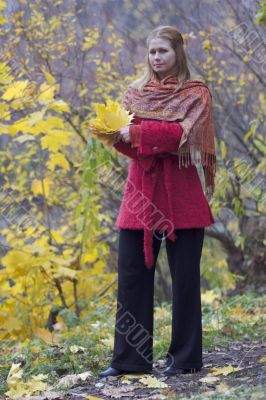Woman in autumn park