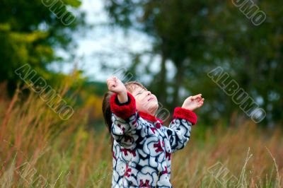 Kid looking up to the sky