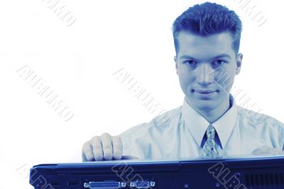 businessman works on laptop, portait