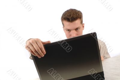  businessman works on laptop