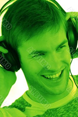 young guy in headphones for music
