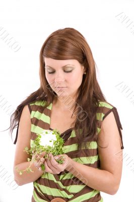Lightbulb burning on a bed of green