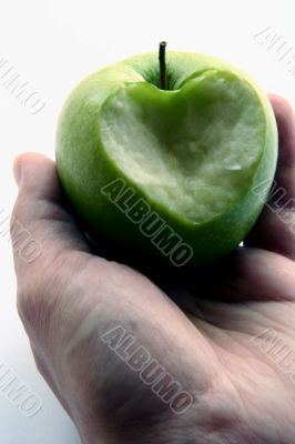Green Apple in men hand