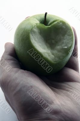 Green Apple in men hand