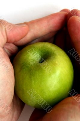 Green Apple in men hand