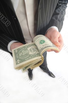 businessman considers money