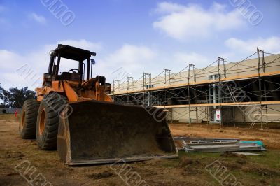 Bulldozer and parking lot construction