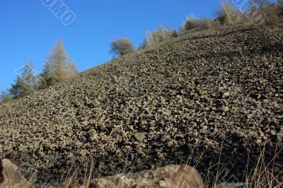 Mountain of defective porphyry