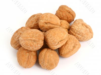 group of walnuts against white