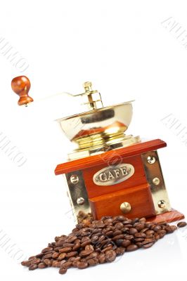 Vintage grinder and coffee beans
