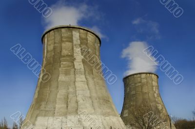 smoking chimneys on blue sky background