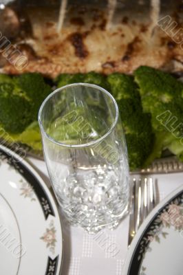 Close-up of baked pink salmon served with broccoli