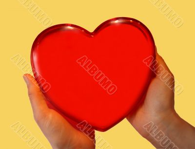 Red symbolical heart .