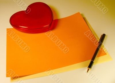 Heart, color paper, pen.