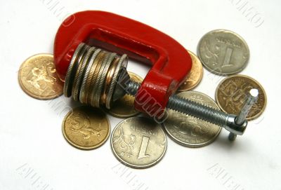 Clamp and coins.
