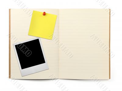 exercise book with photo frame and yellow note