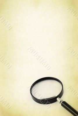 magnifying glass against retro background